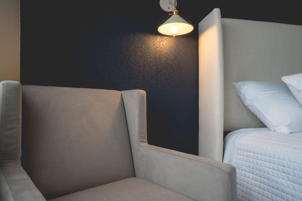 Blackout drapes, iron/ironing board, cribs (free), rollaway beds (free)