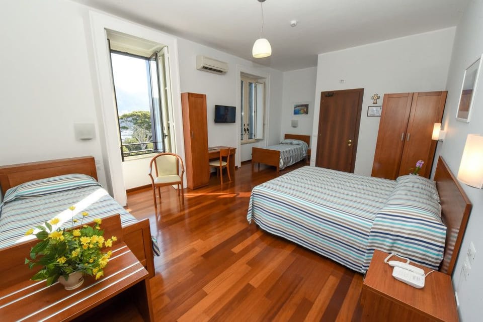 Basic Quadruple Room, Multiple Beds | In-room safe, desk, WiFi (free), bed sheets