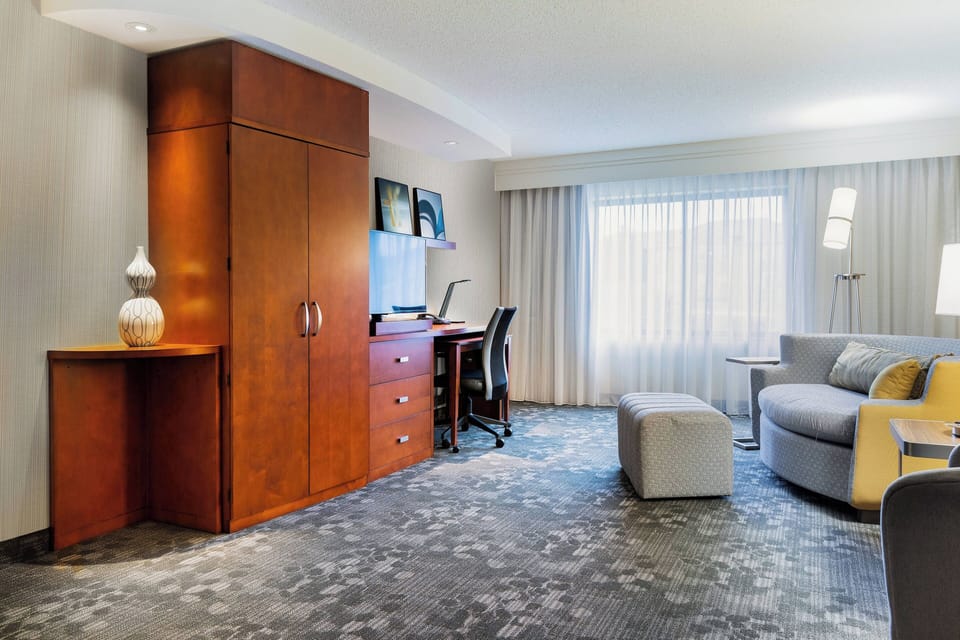 Premium bedding, down comforters, pillowtop beds, in-room safe