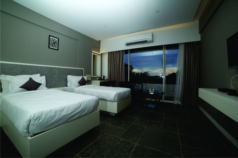 Desk, blackout drapes, iron/ironing board, rollaway beds