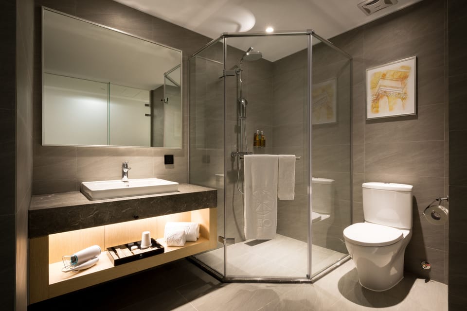 Shower, free toiletries, hair dryer, slippers
