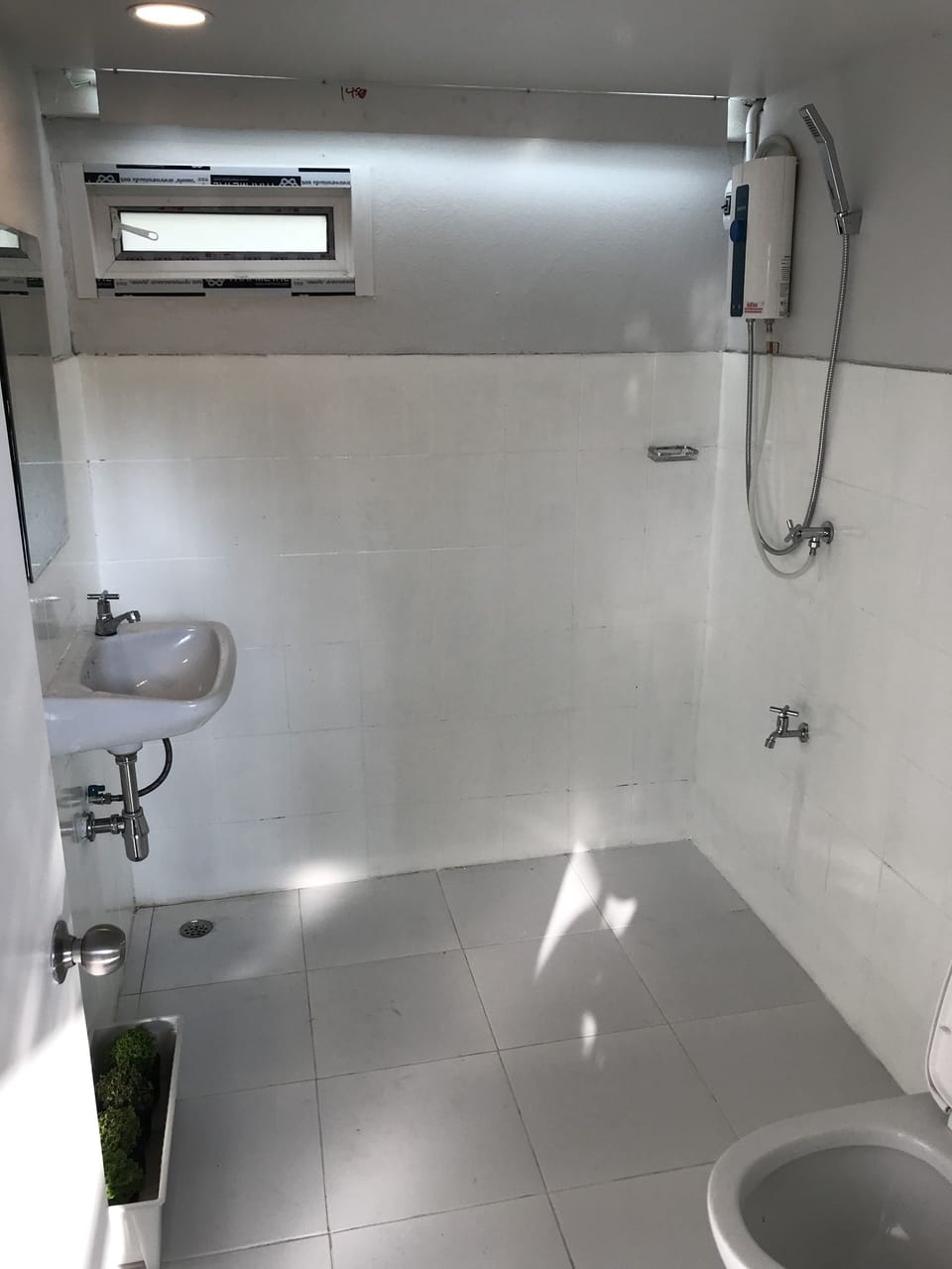 Shower, free toiletries, hair dryer, slippers