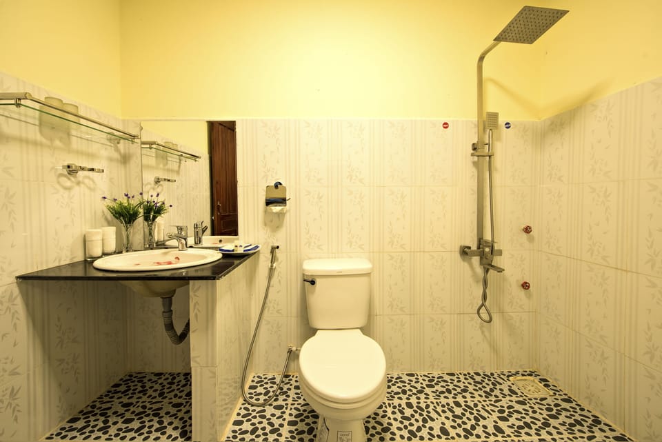 Shower, rainfall showerhead, designer toiletries, hair dryer