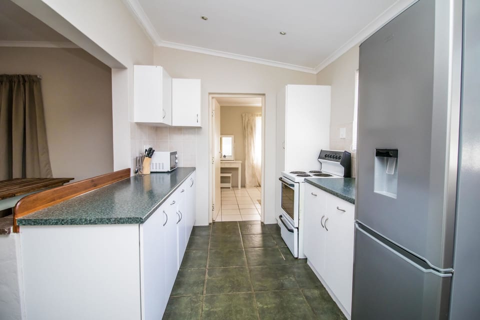 Microwave, electric kettle, cookware/dishes/utensils