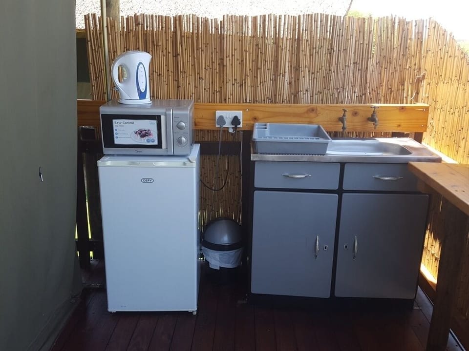 Family Tent, 1 Bedroom, River View | Private kitchenette | Fridge, microwave, electric kettle, cookware/dishes/utensils