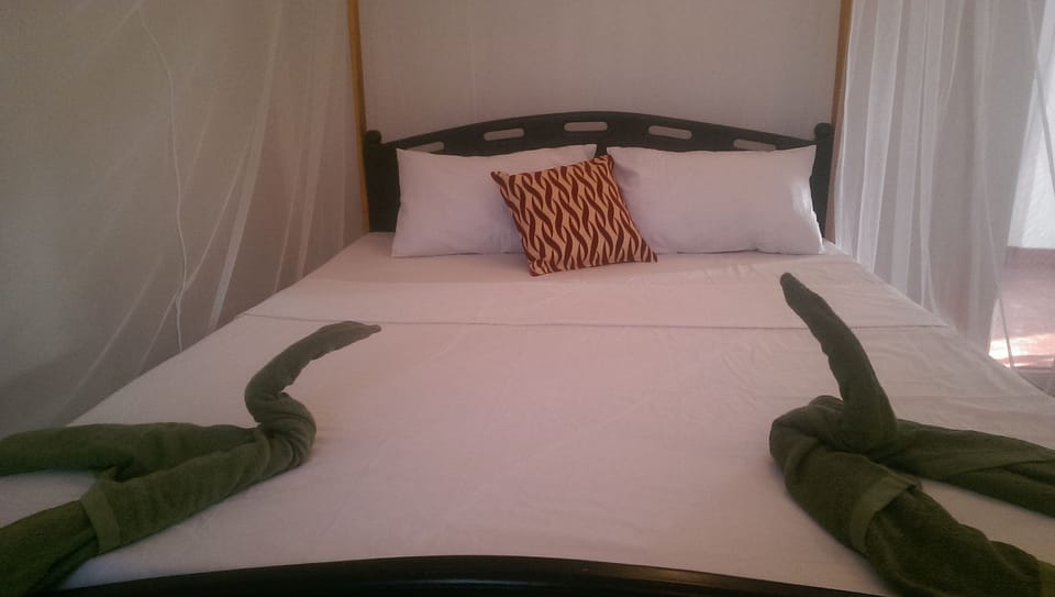 Basic Double Room Single Use, Balcony, Garden View | 1 bedroom, in-room safe, desk, iron/ironing board