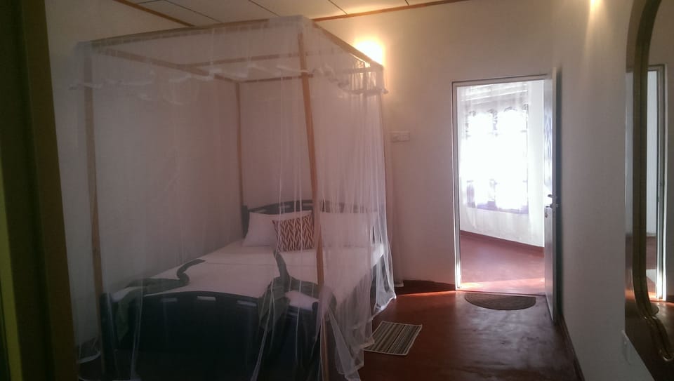 Basic Double Room Single Use, Balcony, Garden View | 1 bedroom, in-room safe, desk, iron/ironing board