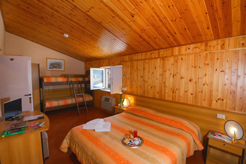 Standard Quadruple Room, Mountain View | Desk, soundproofing, iron/ironing board, cribs/infant beds