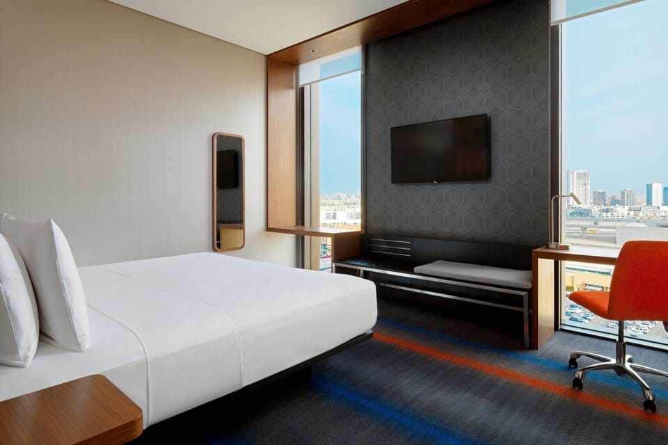 Hypo-allergenic bedding, minibar, in-room safe, desk