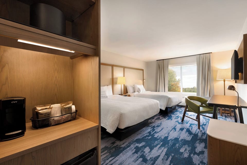 Desk, laptop workspace, blackout drapes, iron/ironing board