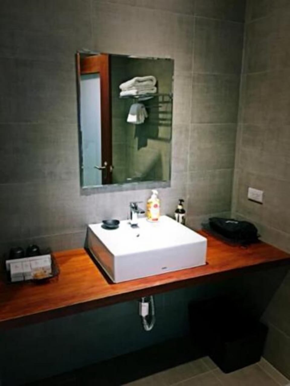 Separate tub and shower, free toiletries, hair dryer, slippers
