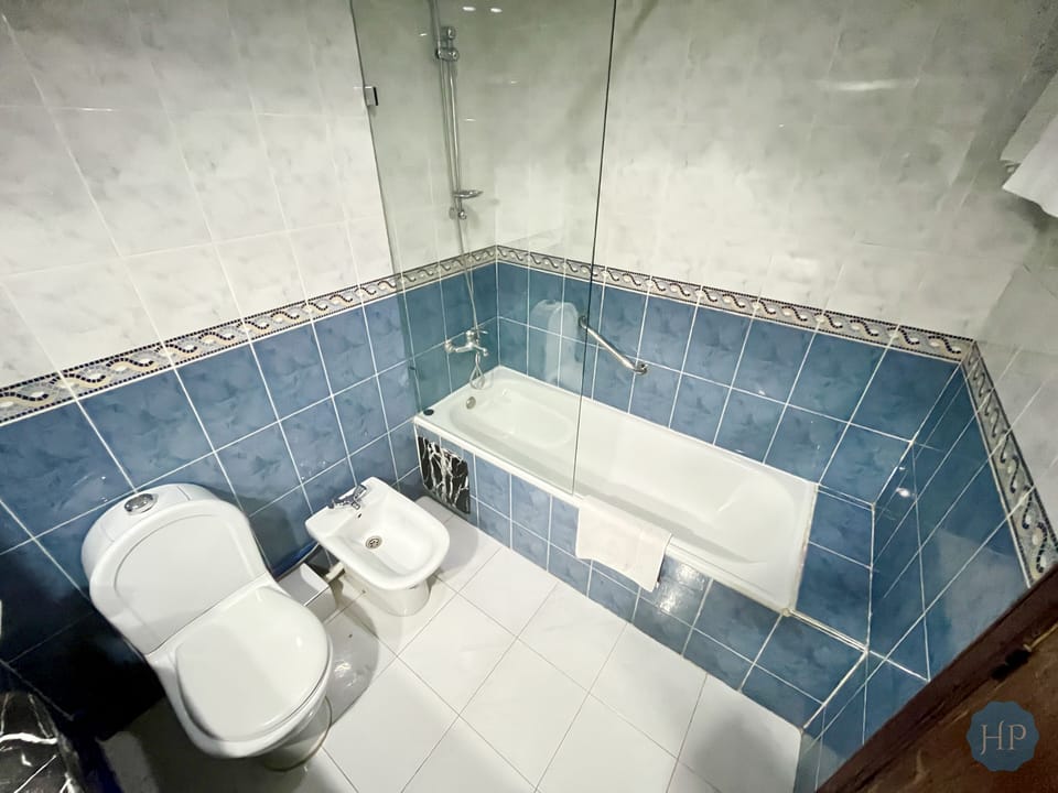 Deep soaking tub, rainfall showerhead, free toiletries, bathrobes