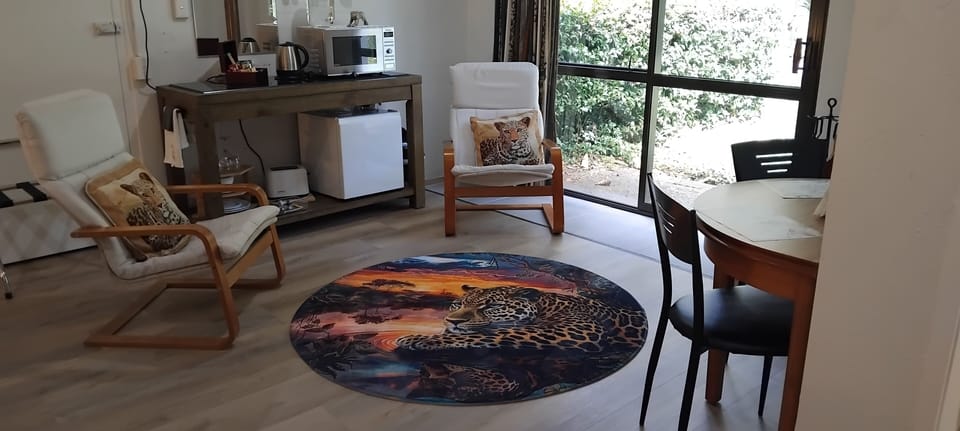 Signature Room, Multiple Beds, Fireplace, Garden View (The Wild Cats Room) | Premium bedding, minibar, individually decorated, individually furnished