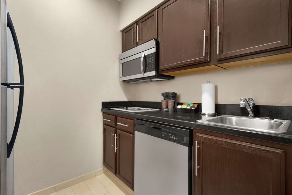 Suite, 2 Queen Beds | Private kitchen | Fridge, microwave, stovetop, dishwasher