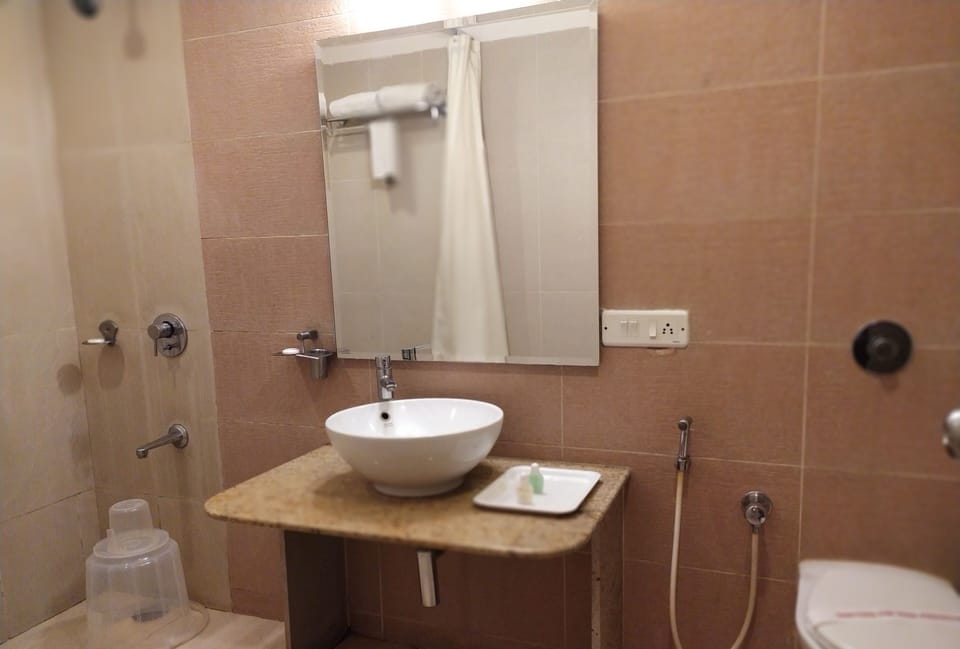 Standard Room | Bathroom | Hair dryer, towels