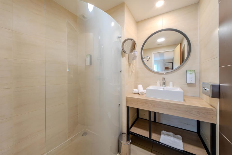Eco-friendly toiletries, hair dryer, towels, soap