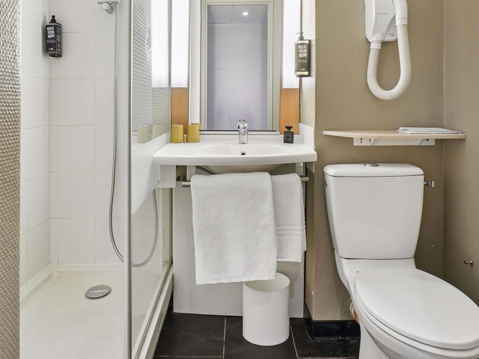 Shower, eco-friendly toiletries, hair dryer, towels