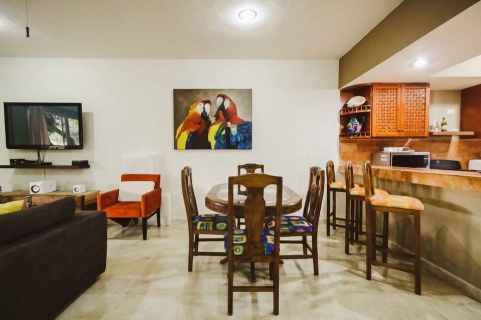Exclusive Condo, 2 Bedrooms | Living area | 50-inch flat-screen TV with cable channels, plasma TV, DVD player