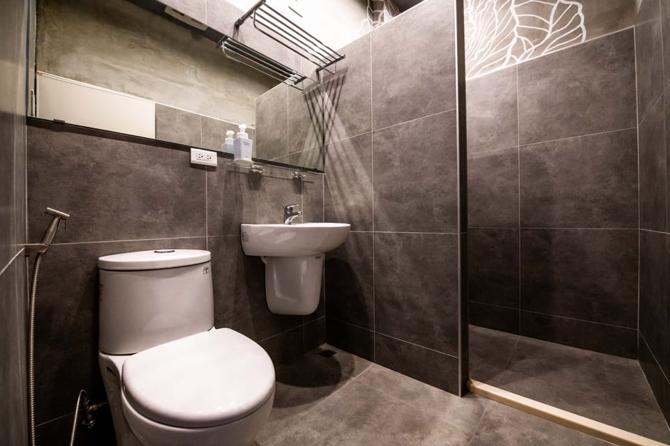 Shower, free toiletries, hair dryer, slippers