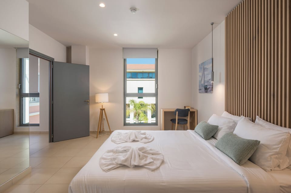 Suite, 2 Bedrooms | In-room safe, blackout drapes, soundproofing, iron/ironing board