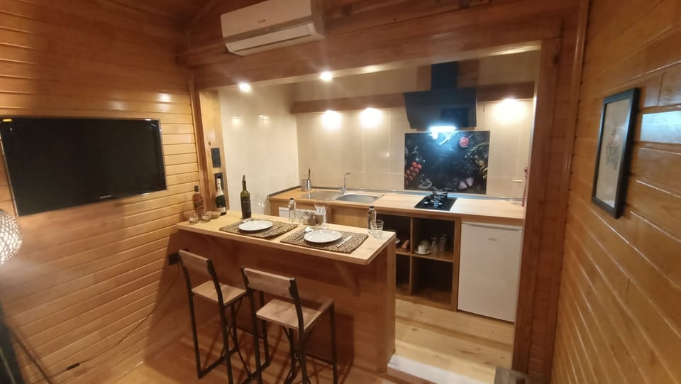 Superior Bungalow, Mountain View, Garden Area | Private kitchen | Stovetop, electric kettle, cookware/dishes/utensils, cleaning supplies