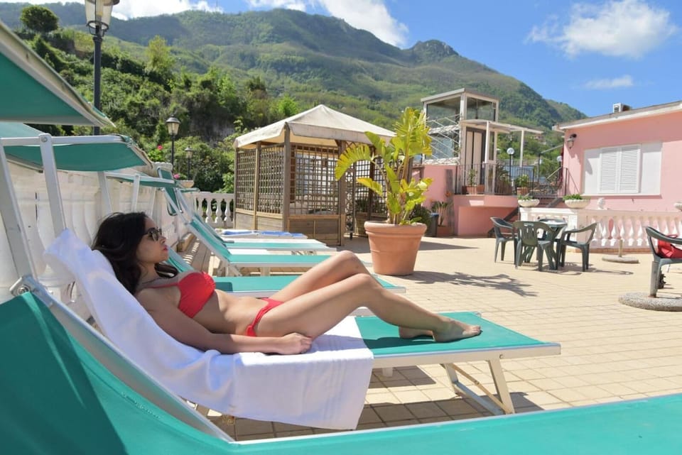 Outdoor pool, open 8 AM to 7 PM, sun loungers