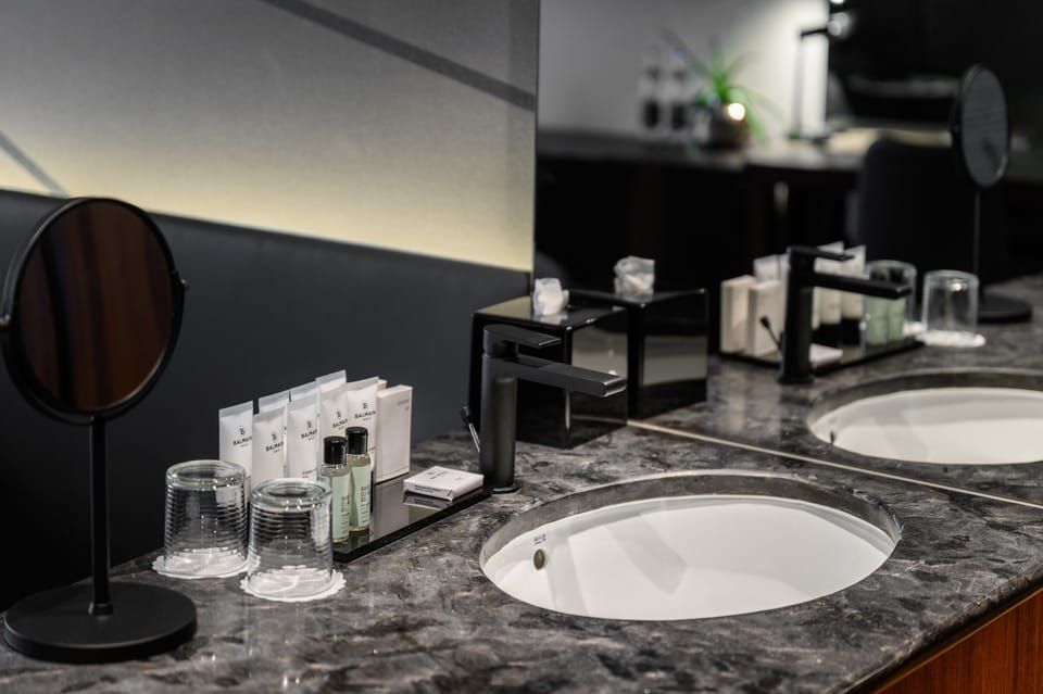 Courtyard - Inner Peace | Bathroom | Designer toiletries, hair dryer, slippers, towels