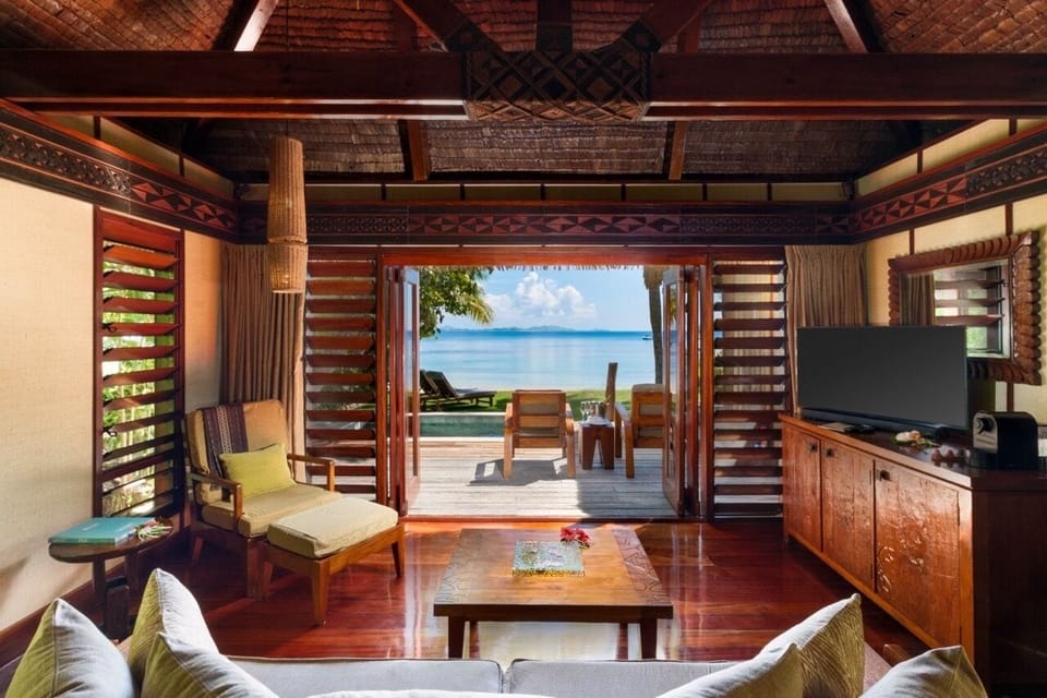 Deluxe Beachfront Bure | Egyptian cotton sheets, premium bedding, pillowtop beds, minibar