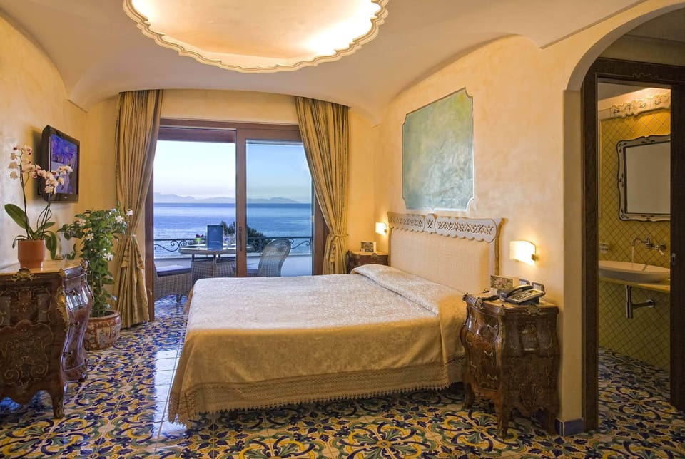 Junior Suite, Balcony | Minibar, in-room safe, desk, blackout drapes
