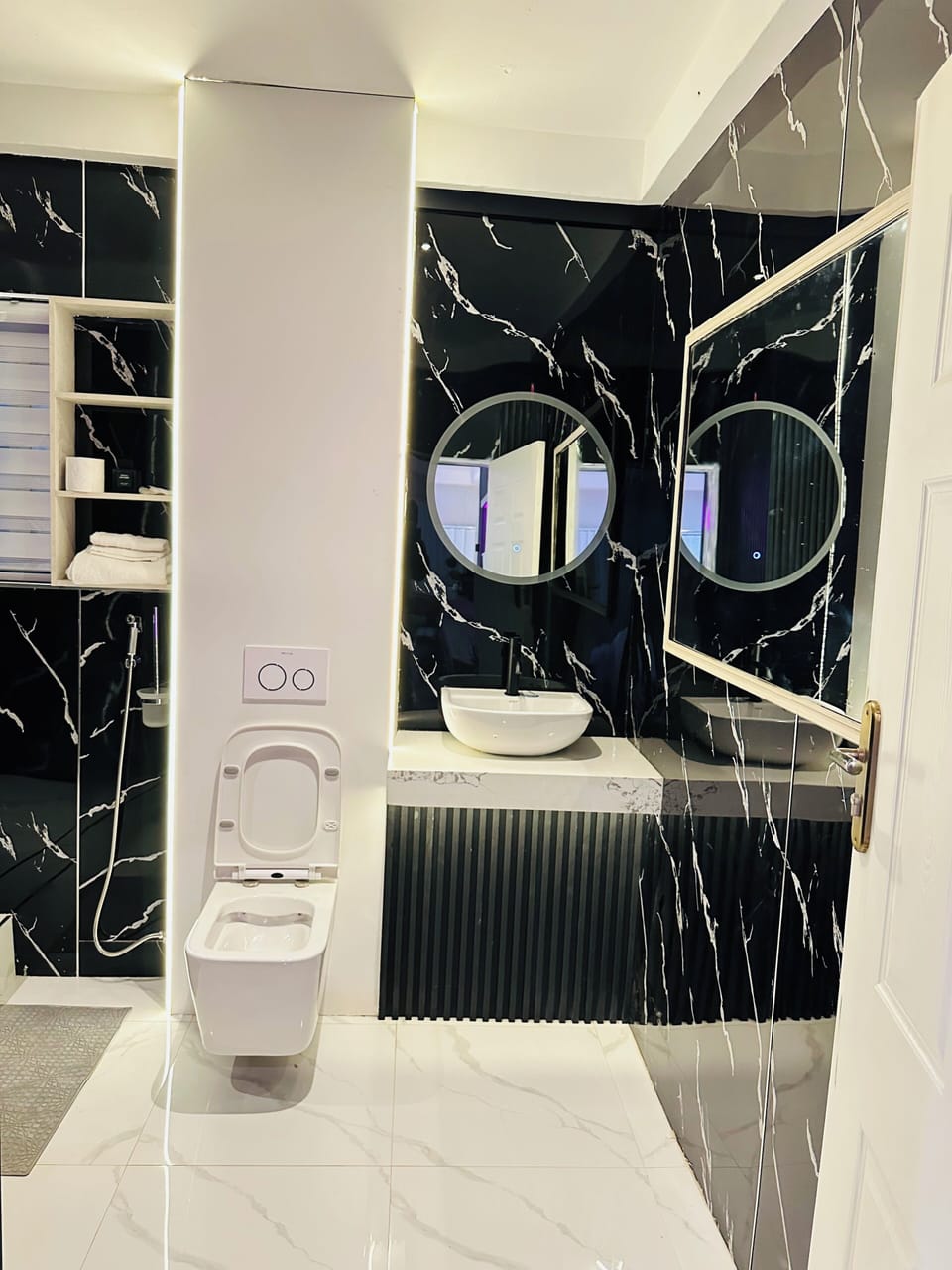 Designer toiletries, towels, soap, shampoo