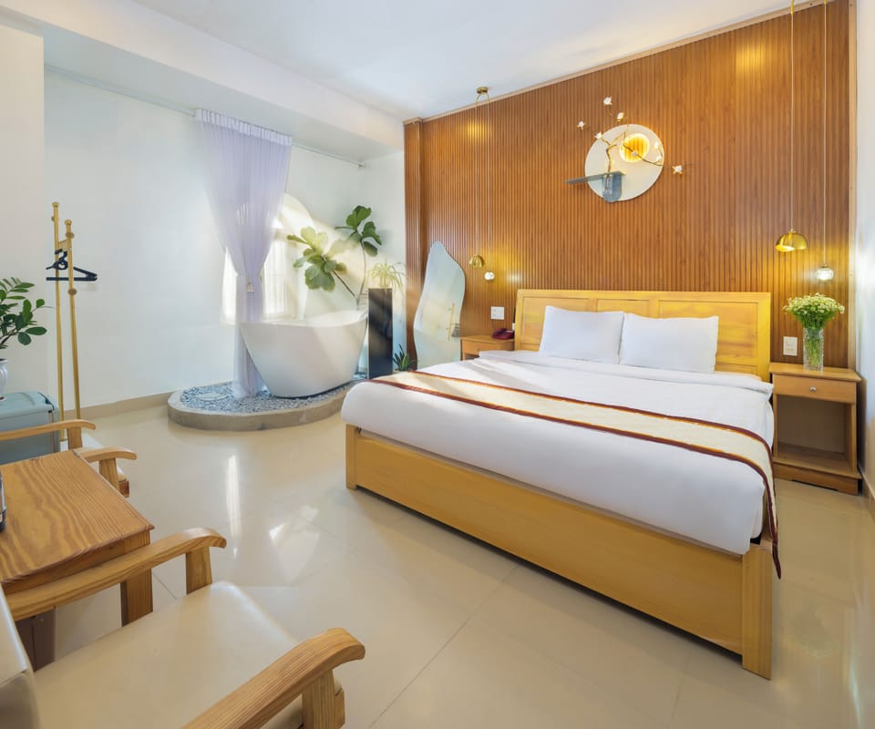 Deluxe Room | Free minibar items, desk, blackout drapes, free WiFi