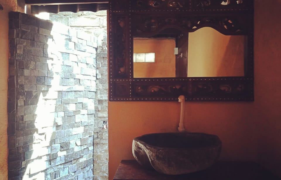 Bungalow, Pool View | Bathroom | Shower, free toiletries, towels