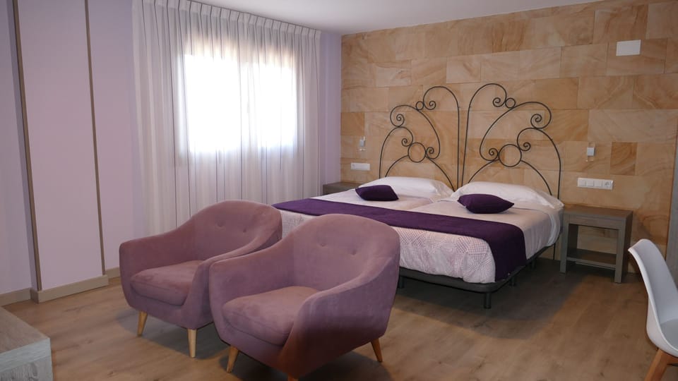 Down comforters, memory foam beds, in-room safe, individually decorated