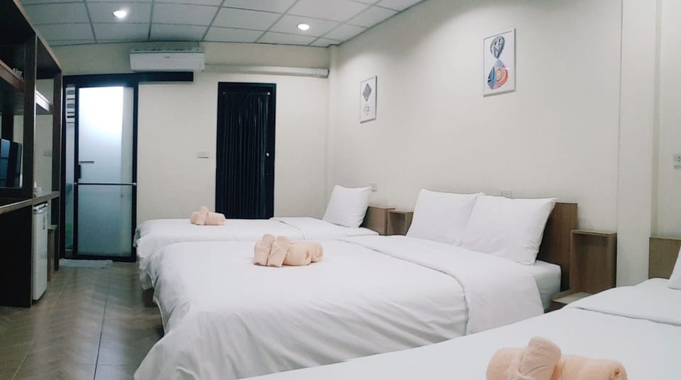 Family Quadruple Room, Multiple Beds | Desk, laptop workspace, blackout drapes, free WiFi