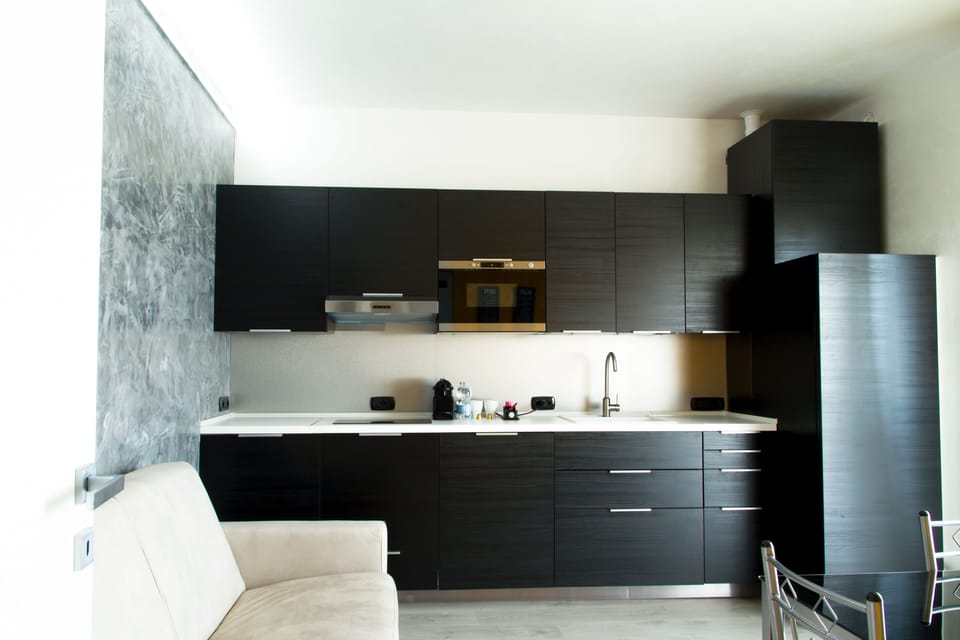 Executive Suite, 2 Bedrooms, Balcony, Tower | Private kitchen | Espresso maker, coffee/tea maker, microwave