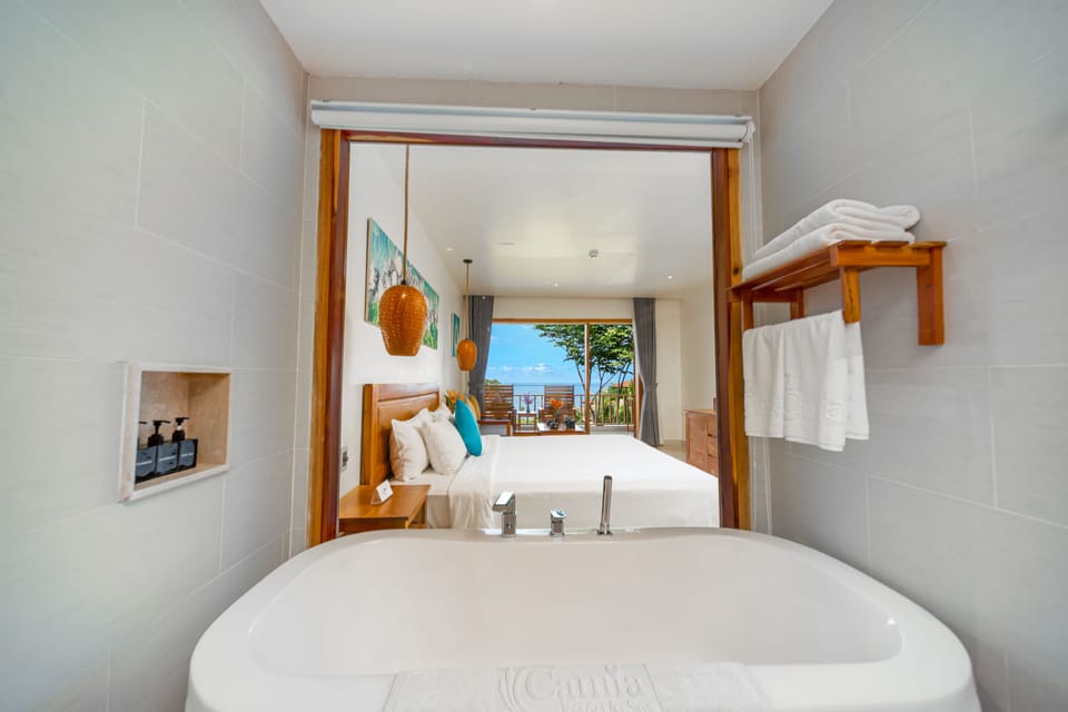 Separate tub and shower, free toiletries, hair dryer, bathrobes