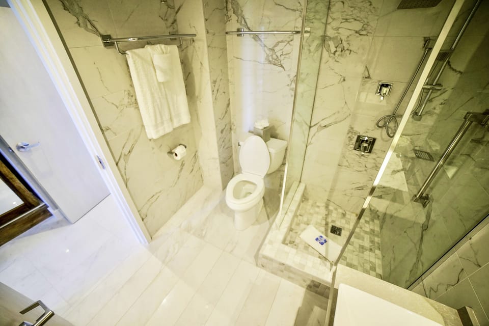 Grand Suite, 2 Bedrooms, Oceanfront | Premium bedding, in-room safe, desk, laptop workspace