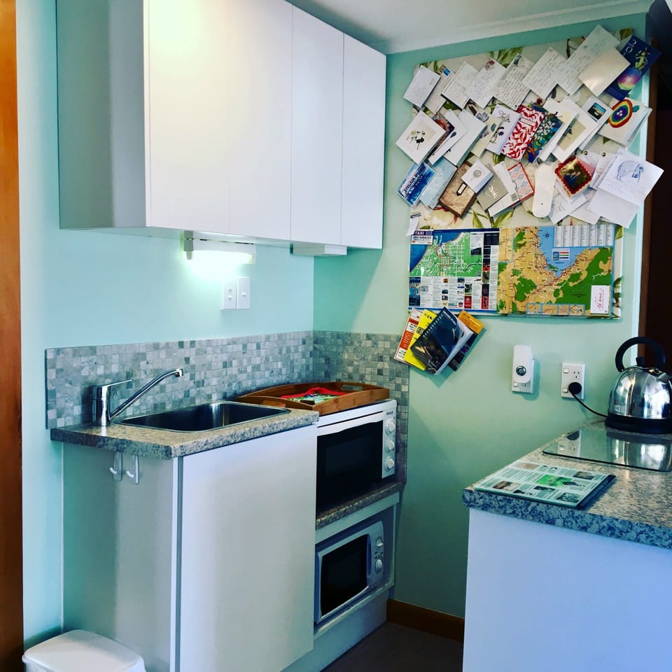 Superior Apartment, 1 Bedroom, Garden View (The Garden Apartment ) | Private kitchen | Coffee/tea maker, full-size fridge, microwave, oven
