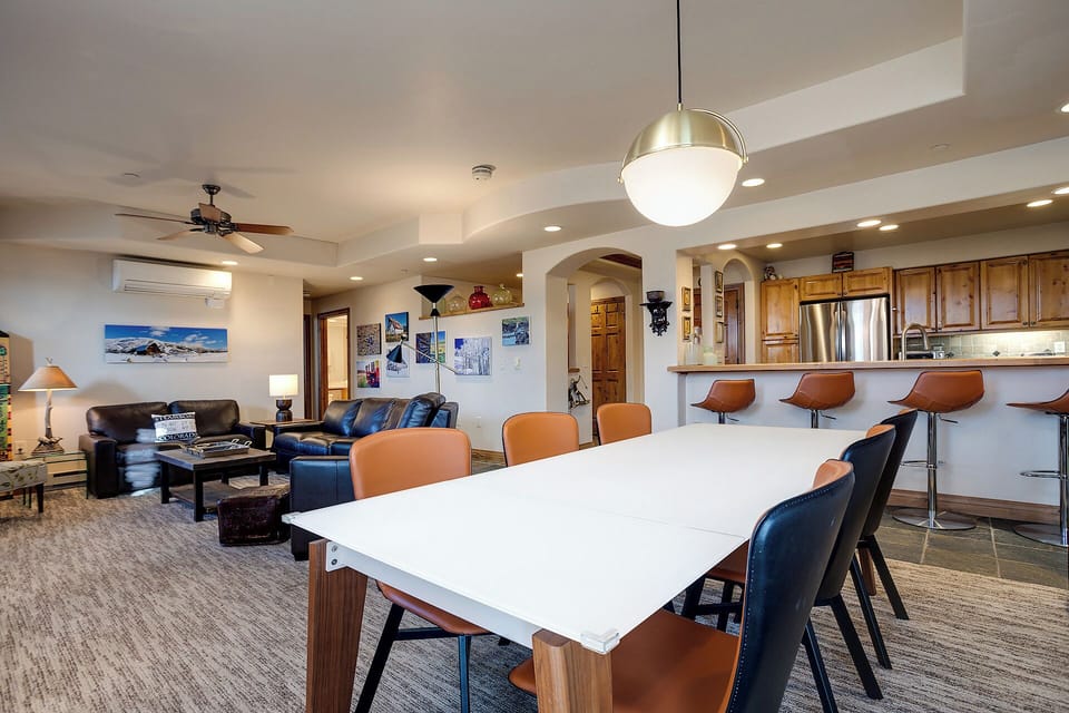 Gather around this beautiful dining table while loved ones cook in your open kitchen - the perfect space for shared meals and memories.