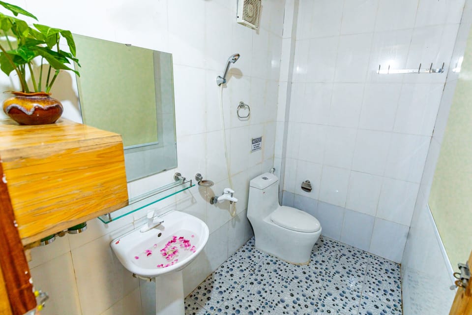 Family Bungalow, Multiple Beds, Balcony, Garden View | Bathroom | Shower, free toiletries, hair dryer, bathrobes