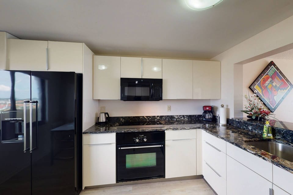 Fully Equipped Kitchen with Granite Counter Tops