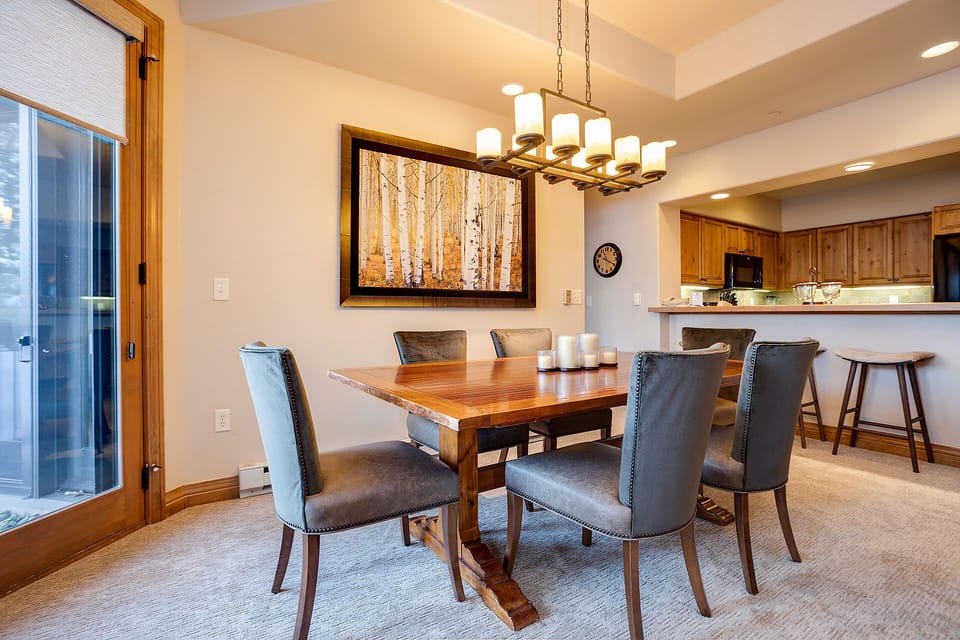 Gather around this elegant dining table where memorable meals and conversations await you in this beautifully appointed space.
