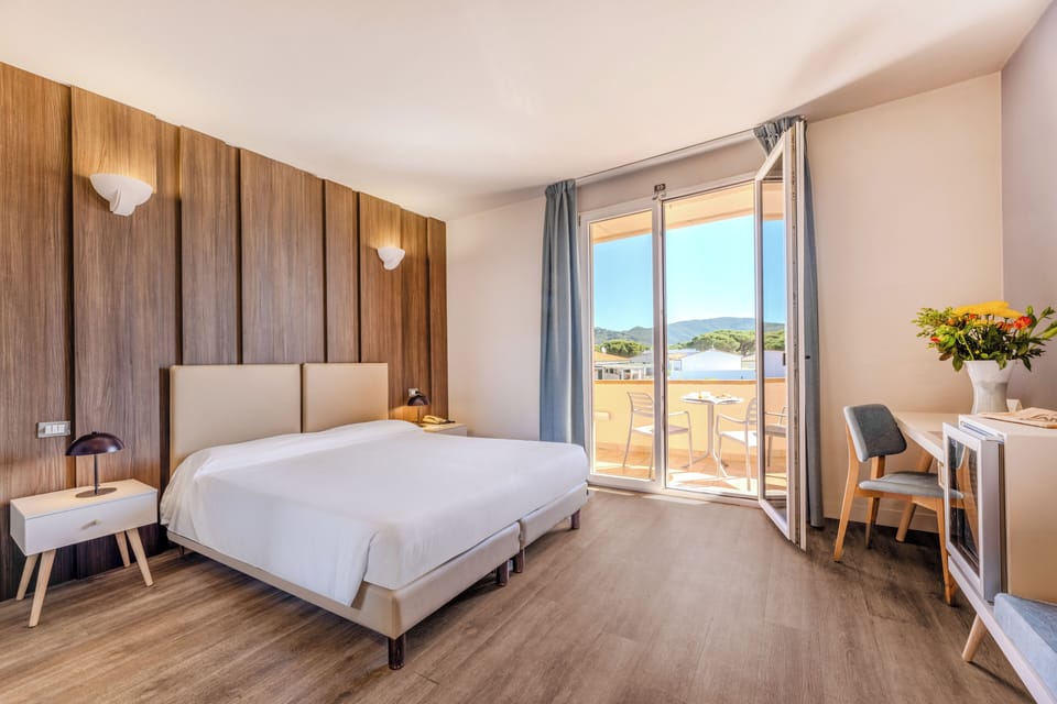 Superior Double or Twin Room, Balcony, Partial Sea View | Minibar, in-room safe, desk, free WiFi