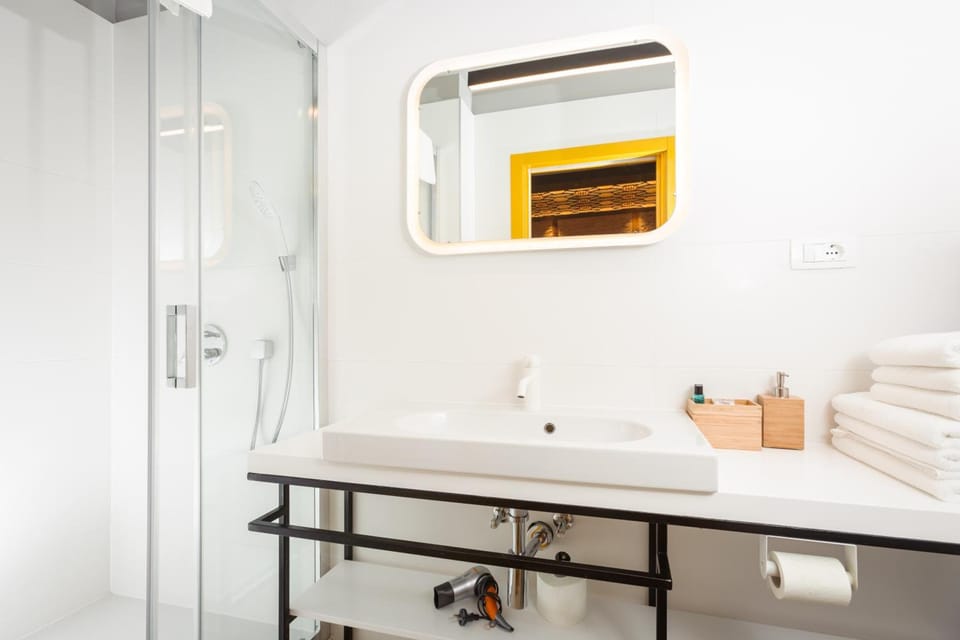 Shower, free toiletries, hair dryer, bathrobes