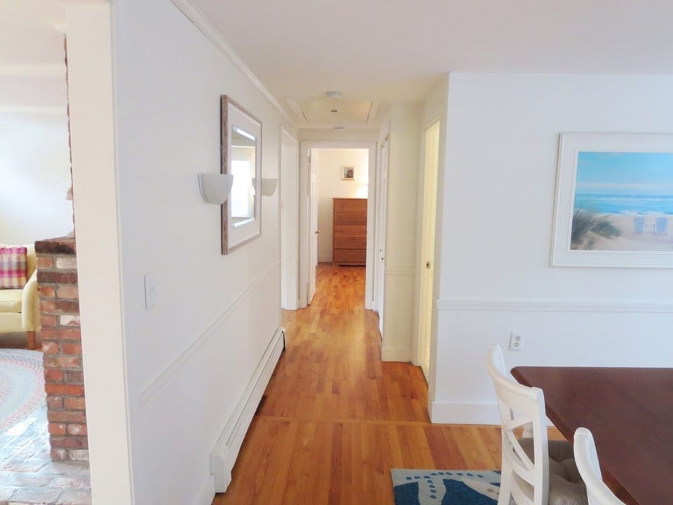 Hallway from kitchen to Bedrooms 2 & 3 as well as the full bath and laundry area - 142 George Ryder Road  Chatham Cape Cod - New England Vacation Rentals