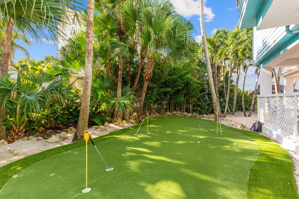 Private putting green, with complimentary putters and golf balls