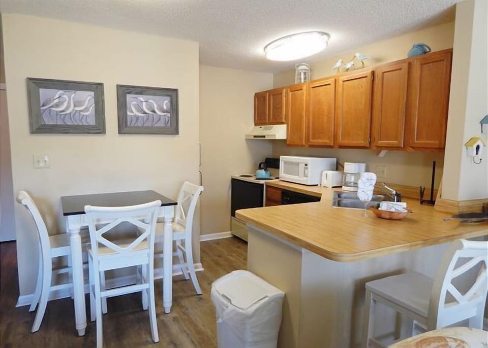 Your fully equipped kitchen and dining area offers everything you need to prepare meals and gather for cozy breakfasts or intimate dinners.