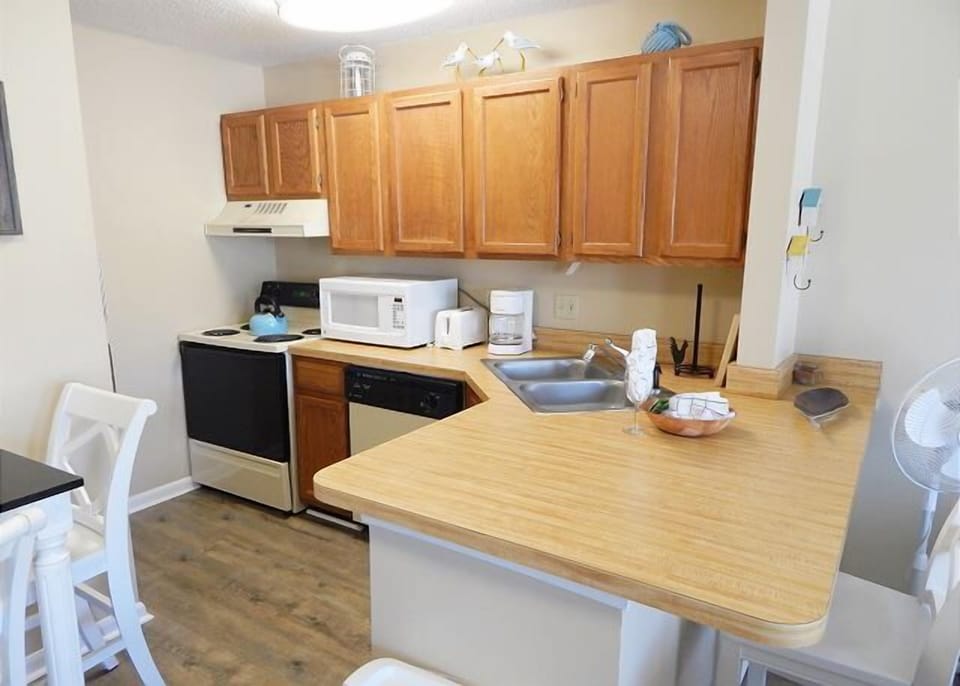 Your fully equipped kitchen features everything you need for home-cooked meals, with ample counter space and modern appliances.