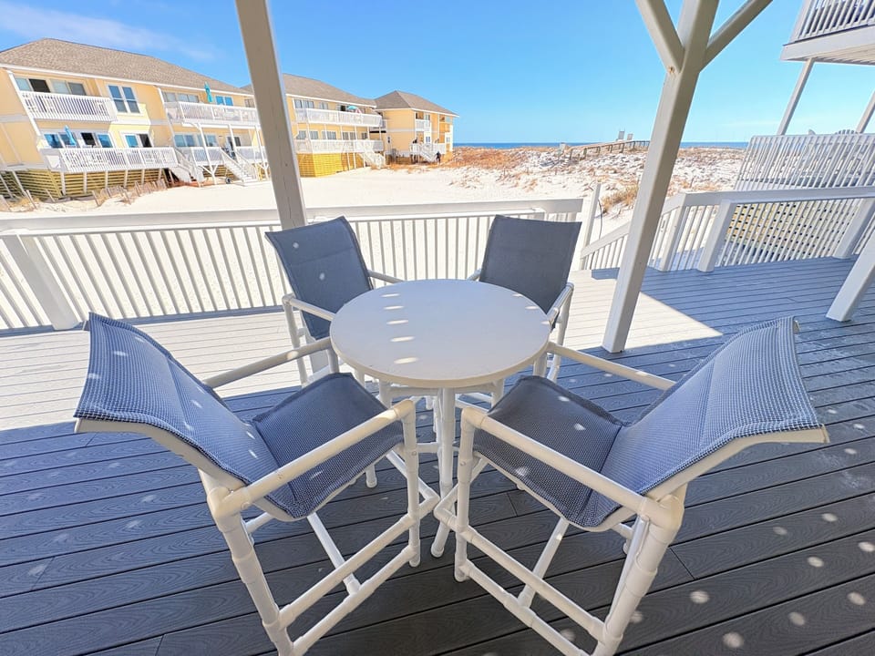 Your private deck offers front-row seats to pristine white sands and endless ocean views—perfect for morning coffee or sunset cocktails.
