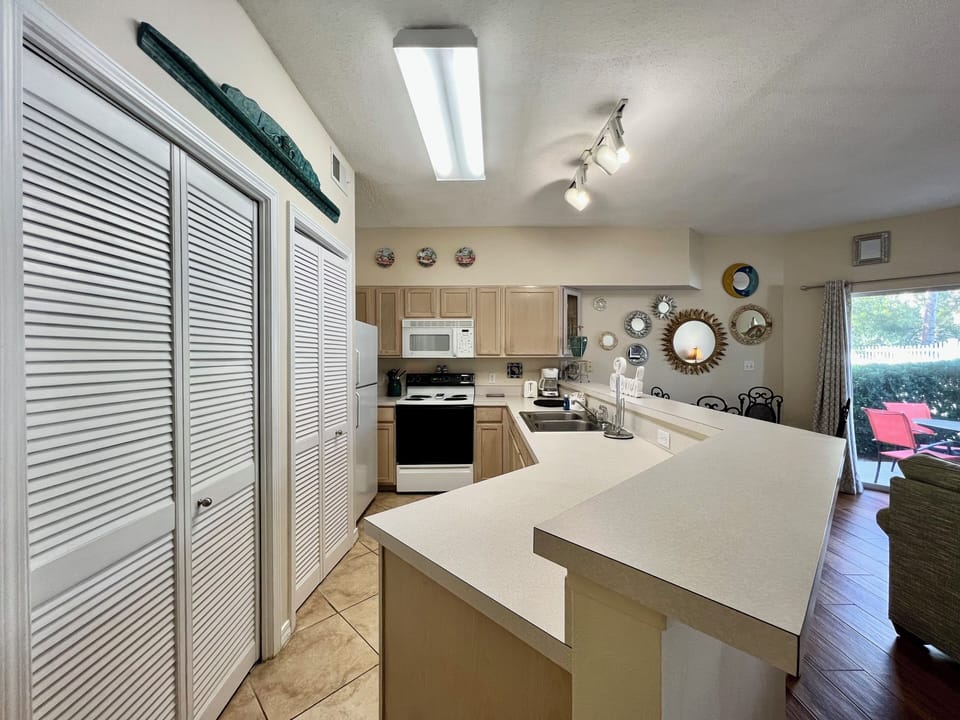 Your fully equipped kitchen features modern appliances and ample counter space for preparing memorable vacation meals together.